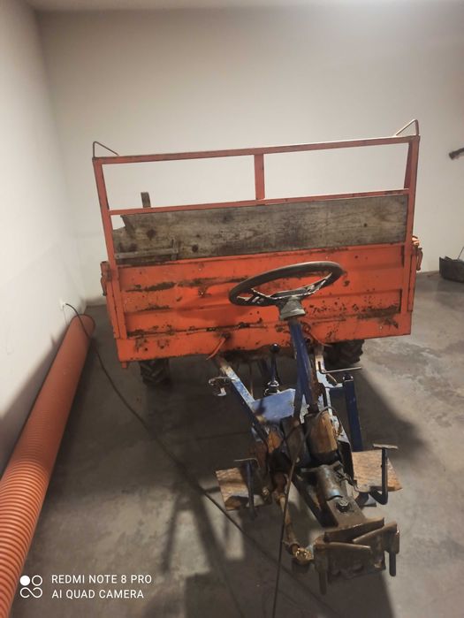 Reboque motocultivador basculante