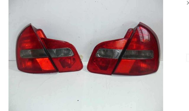 Lampy tylne  w błotnik i klapę Mitsubishi CARISMA LIFT 00-2004 komplet