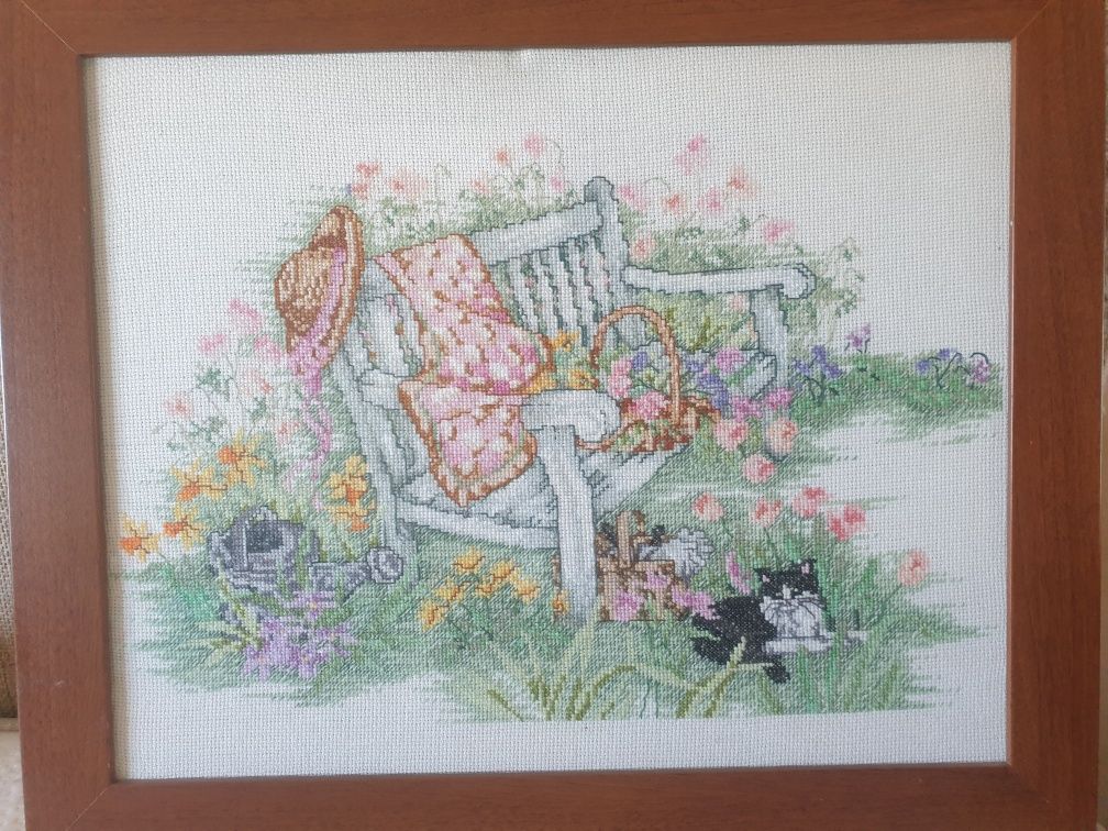 Quadro de banco de jardim muito bonito feito em ponto decruz