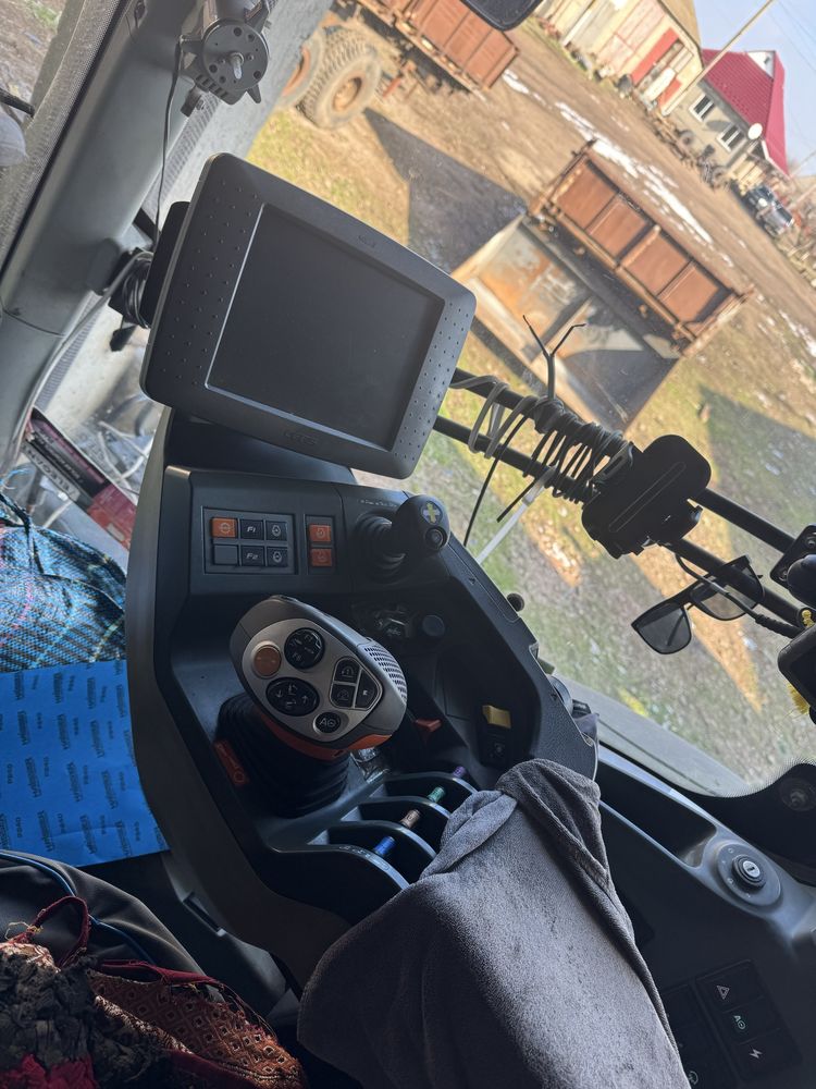 Трактор Claas Axion 940 2014