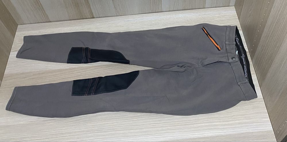 Brązowe bryczesy dziewczęce Fouganza nogawka 72cm