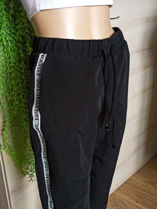 Sg Czarne spodnie 36 , S z lampasami Amisu New York sportowe spodnie
