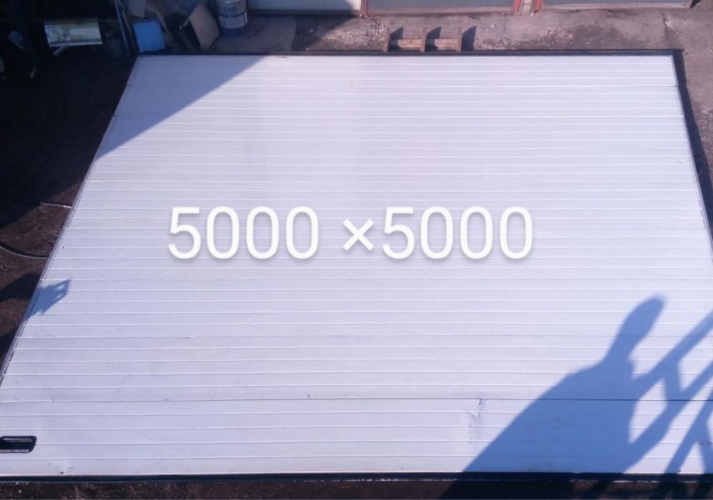 Brama segmentowa 350x280 wys Hormann dwa przeszklenia opcja naped ele