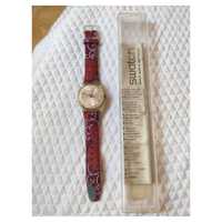 Relógio Swatch com bracelete bordada