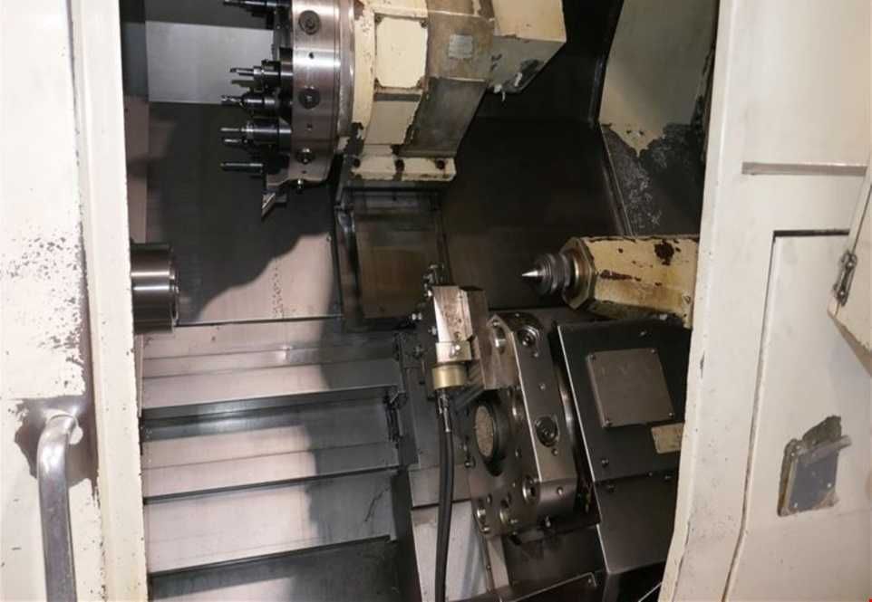 Токарний з ЧПУ Okuma  LU 15, 2000 рік, рухомий люнет, двохканальний