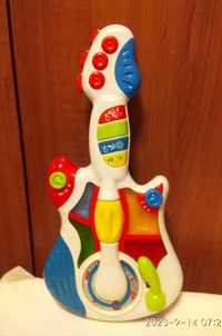 Детская интерактивная  гитара со светом и звуком.