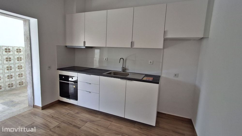 Moradia em banda, em zona tranquila e atmosfera acolhedora.