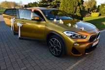 AUTO do ślubu Złote BMW X2  + 9-os Caravelle do Transportu Gości