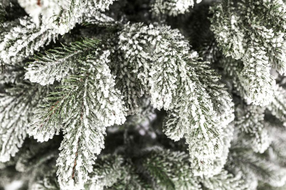 Штучна засніжена ялинка купити