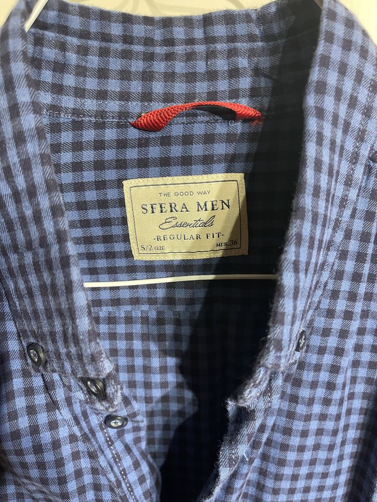 Camisa xadrez azul e preta