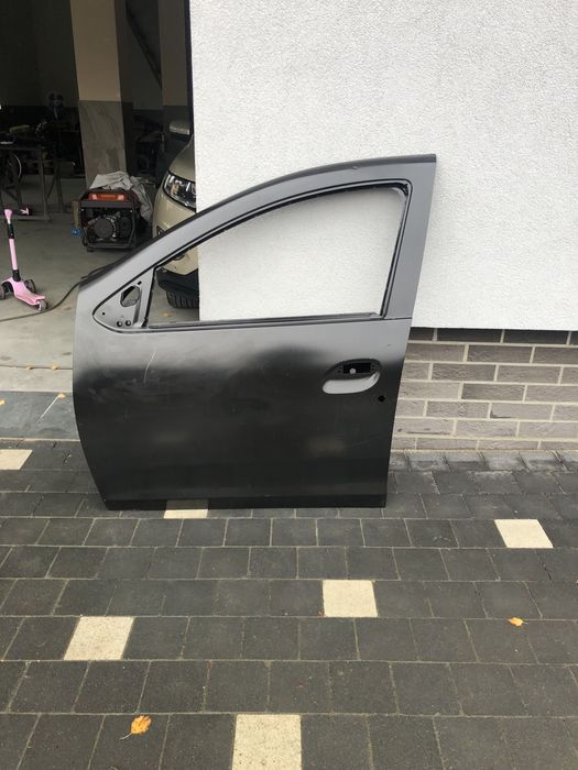 Двері нові оригінал до Renault Dacia Duster 2