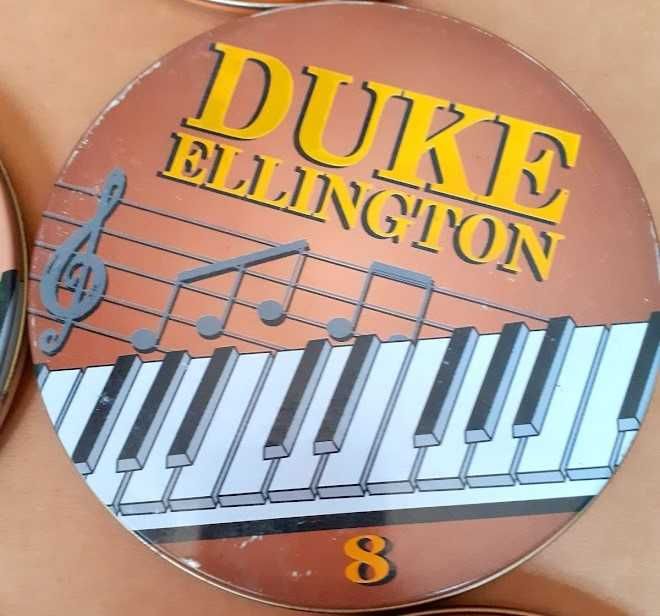 Coleção de Cd´s em caixas metal.