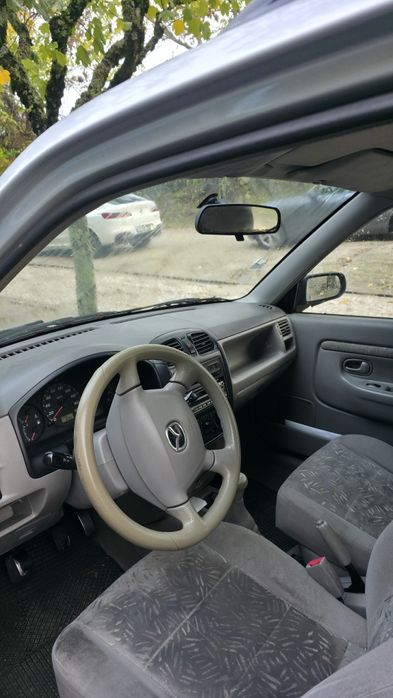 Mazda demio completo