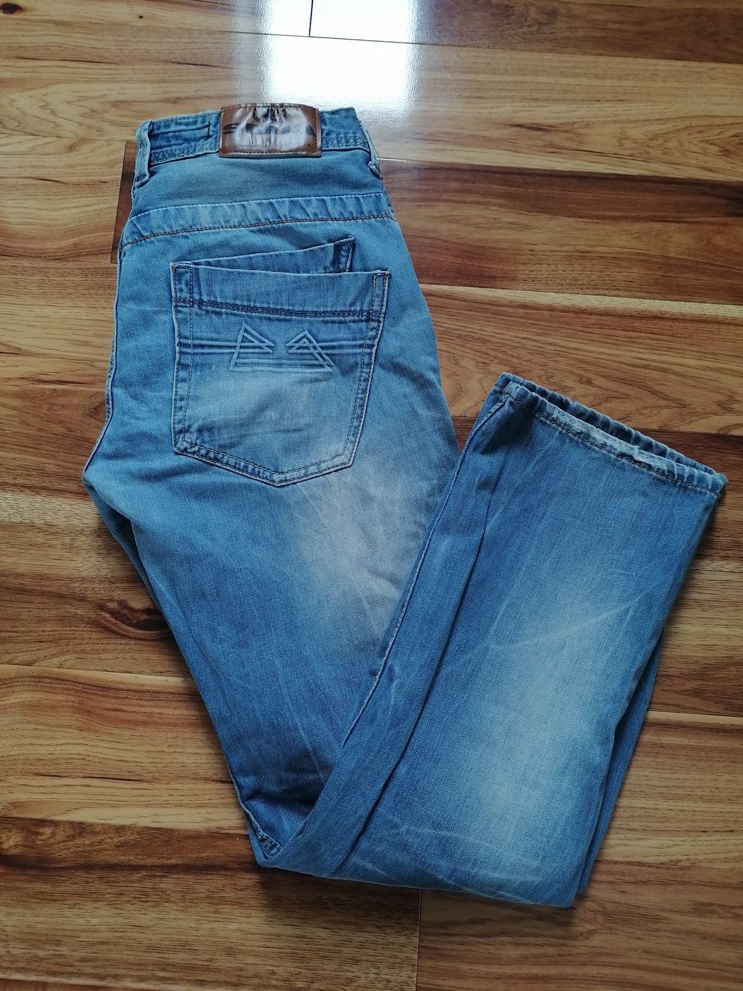 Spodnie dżinsy L