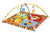 Игровой, развивающий коврик для младенцев с подвесными игрушками.
