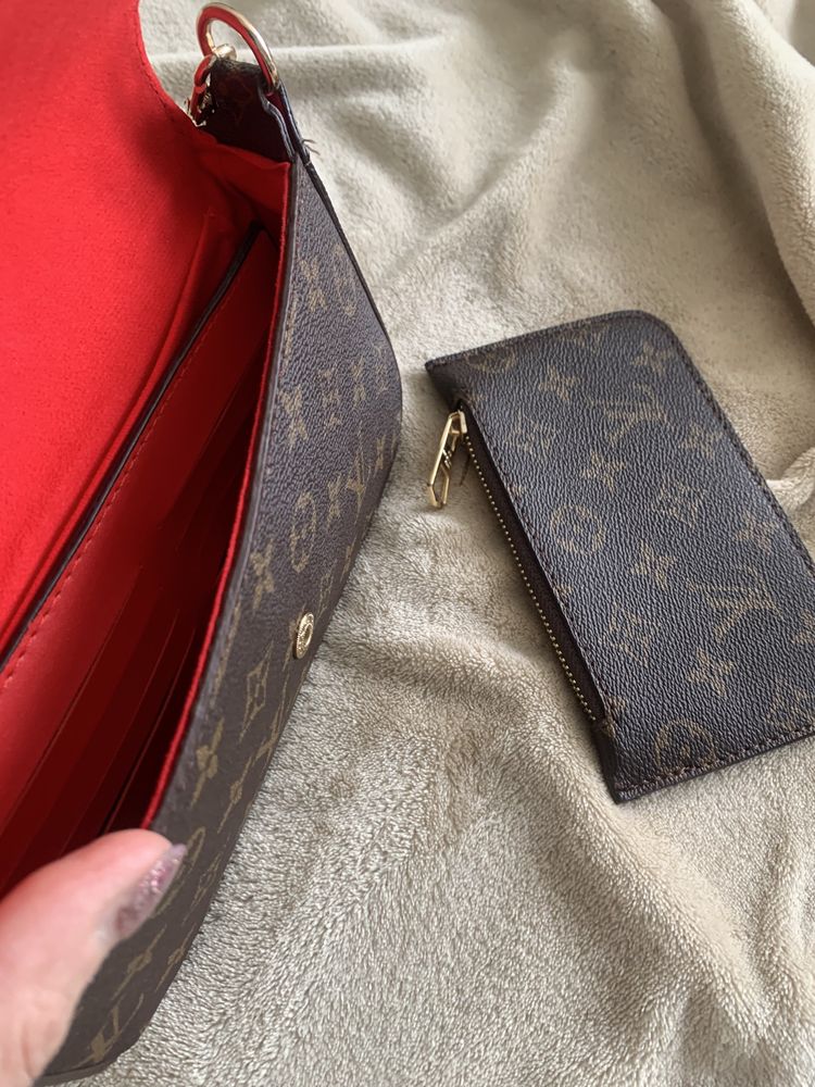 Клатч Louis Vuitton