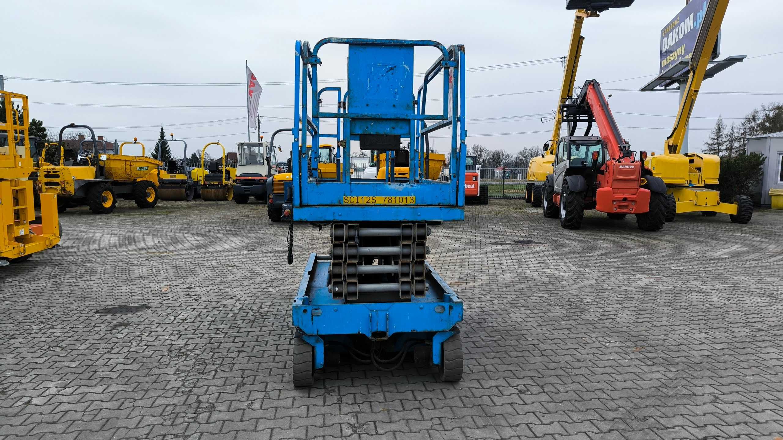 Elektryczny podnośnik nożycowy GENIE GS 3246 rok 2008 cena 20500 netto