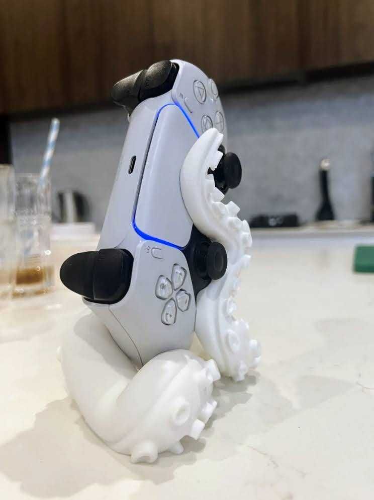 Suporte para comando da consola Playstation 5 em forma de tentaculo