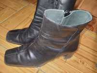Botas com salto alto