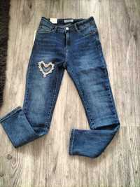 spodnie l 40 z sercem jeans