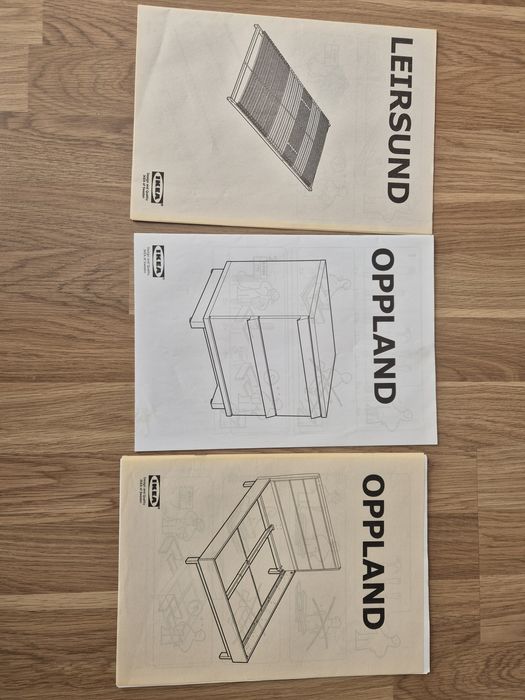 Łóżko drewniane Ikea Oppland z szafkami nocnymi.