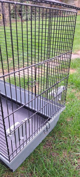 Klatka dla ptaków+poidełko,dozownik karmy i zabawka