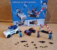 Legos com 3 bonecos e 2 carros, policia e ladrão, novo em caixa .