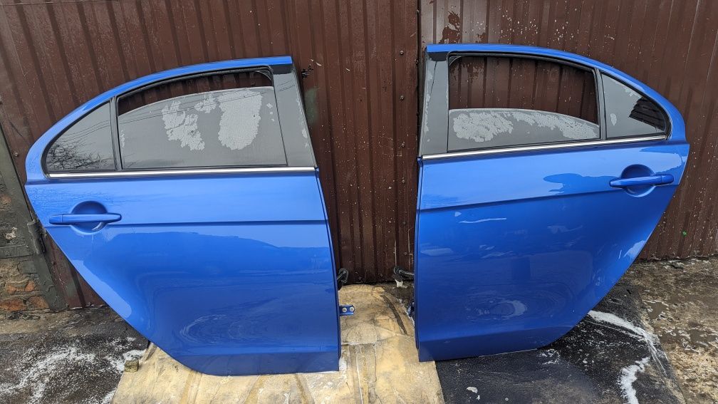Задні двері ліві, праві Mitsubishi Lancer 10, X Ланцер седан