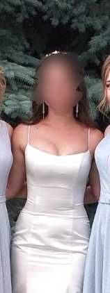 Весільна сукня з шлейфом та корсетом