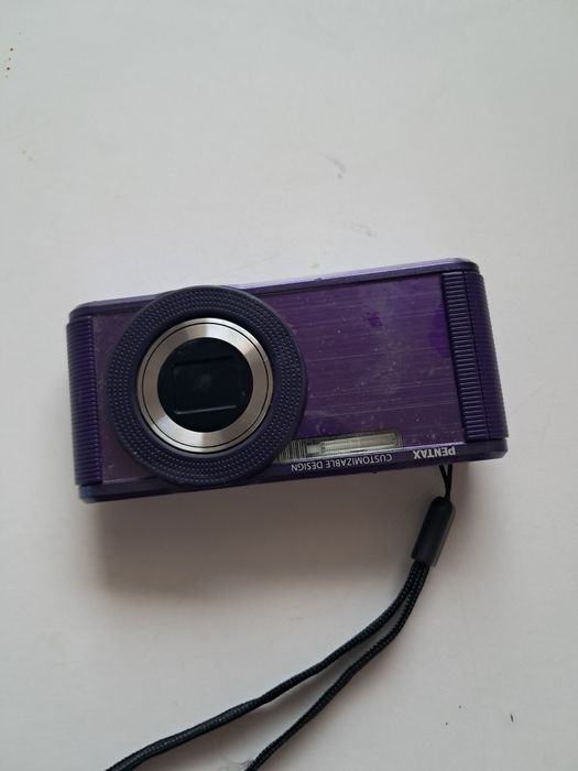 Nieaktualne Mininaturowy aparat fotograficzny Pentax16 mpx