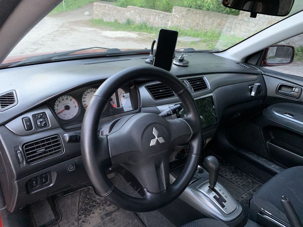 Mitsubishi lancer 1,6газ/бензин автомат