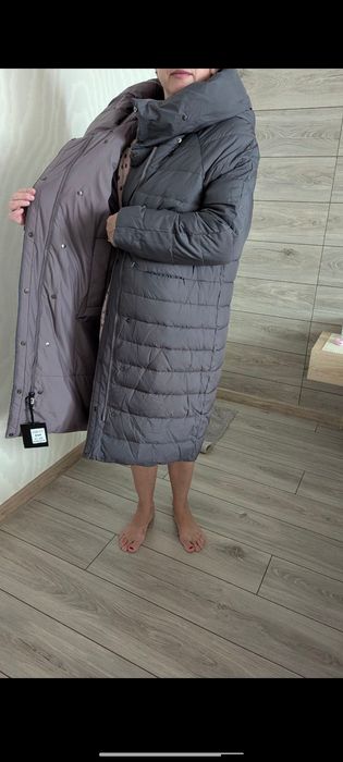 Пальто пуховик нове,на дві сторони.