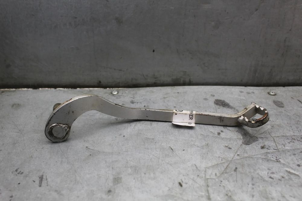 Kymco Stryker 125 Dźwignia hamulca tylnego tył stopka