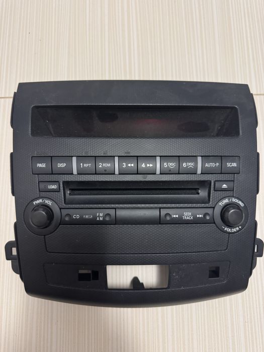 Продам оригинальную панель магнитофона на автомобиль митсубиси