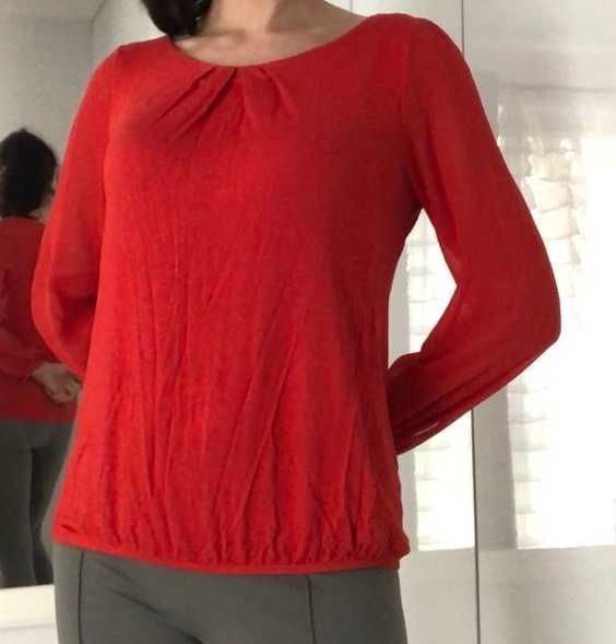 Czerwona bluzka damska z długim rękawem, gumka u dołu i na rękawach