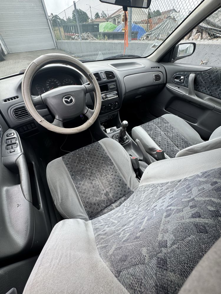 Mazda 323F 1.4i 75CV