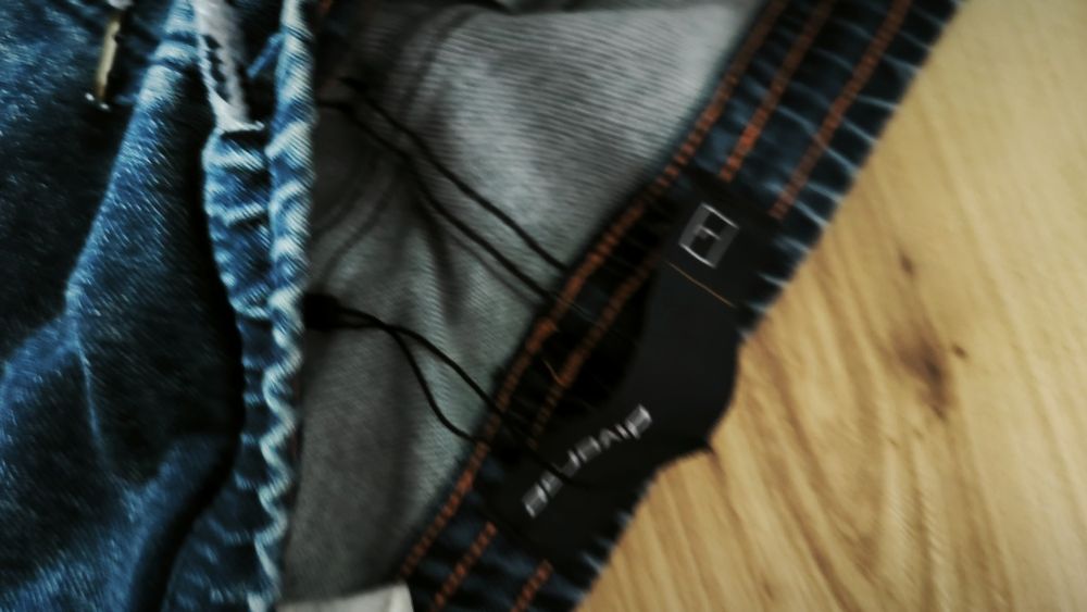 Spodnie krótkie dżinsowe męskie spodenki z jeansu granatowe marmurko L