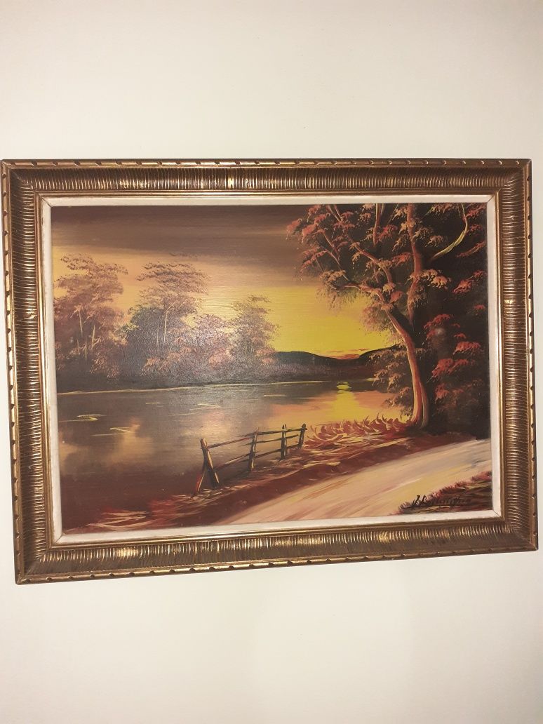 Quadro paisagem com moldura dourada