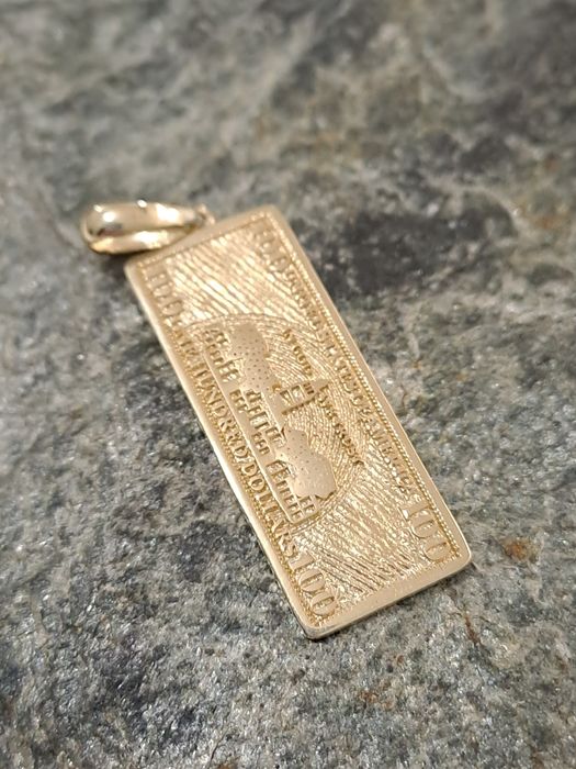Złota zawieszka Dolar pr.585 Nowa 4 x 1.2 cm