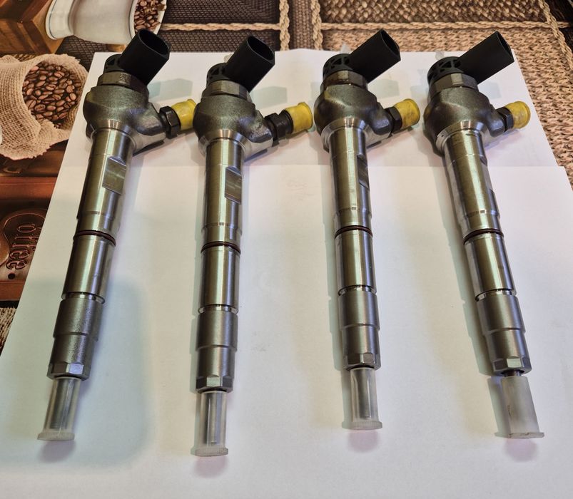 Wtryskiwacz Wtrysk AUDI VW CR 2.0 TDI 04L130277AE Oryginał