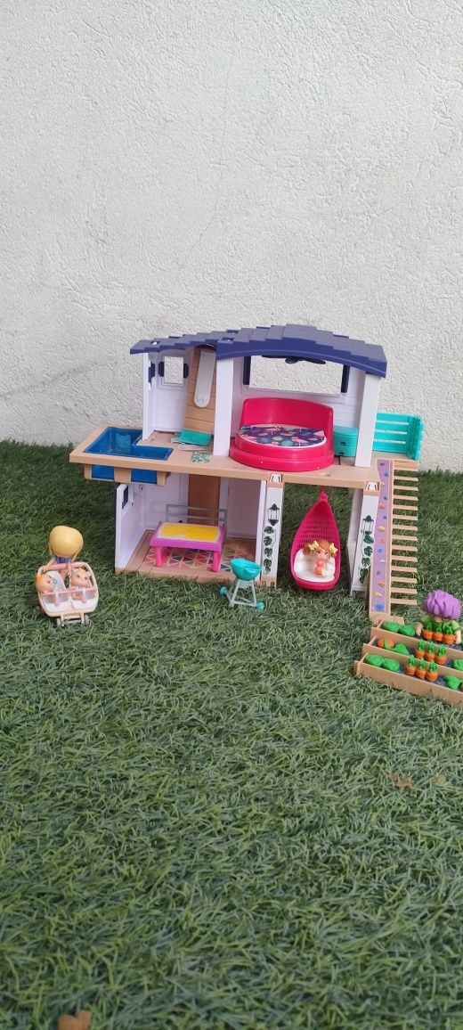 Casa de bonecas .
