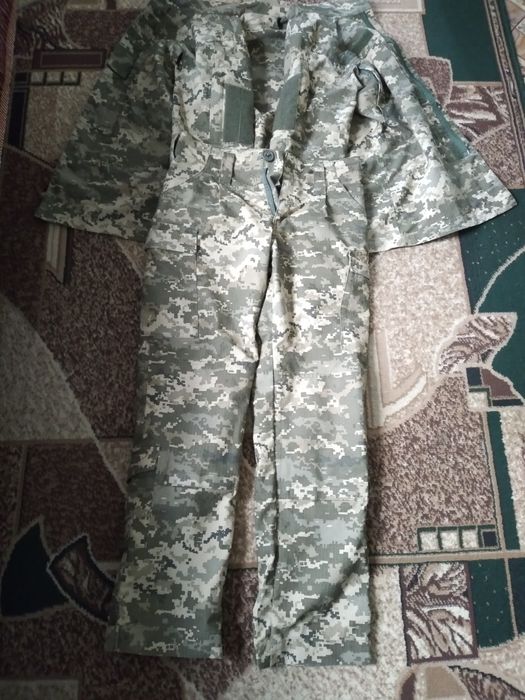Продам комуфляж костюм