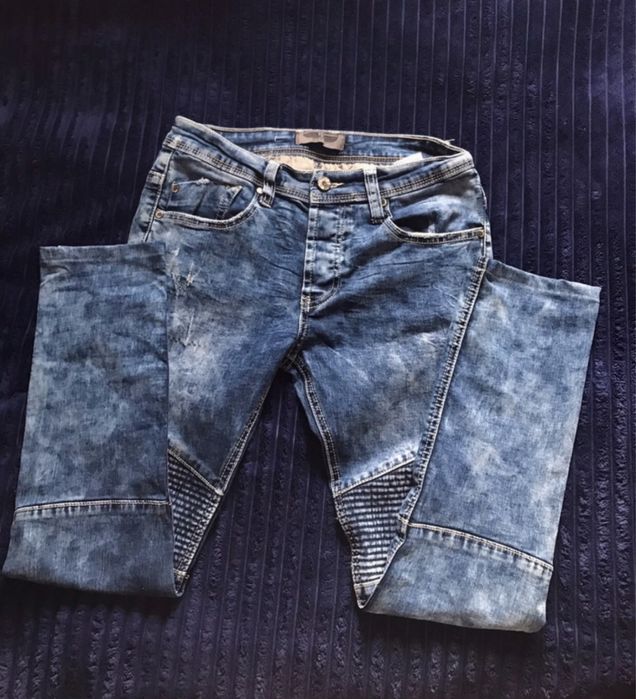 Niebieskie spodnie dżinsowe 29 na wiele guzików Denim