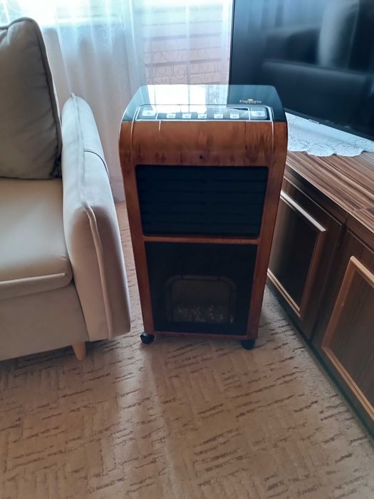 Przenośny grzejnik z funkcją kominka, klimatyzacji oraz jonizacji.