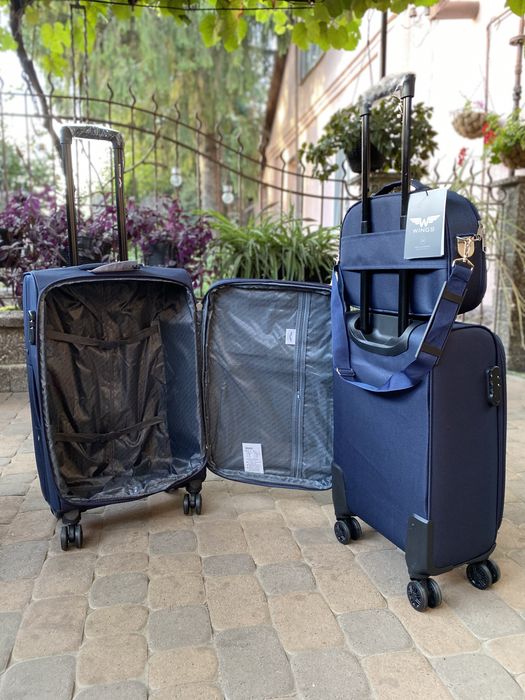 Чемодан .Ваоіза  L велика польського бренду  WINGS ,чемодан