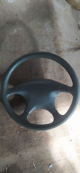 руль Митсубиси лансер