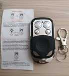 Pilot uniwersalny do bramy + bateria