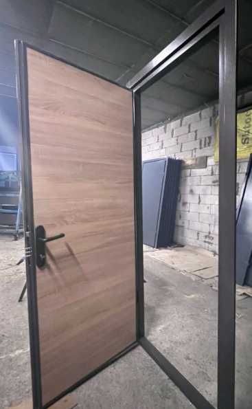Двері вхідні технічні металеві тамбурні з ДСП накладками