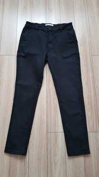 Czarne spodnie jeansy Zara r.40