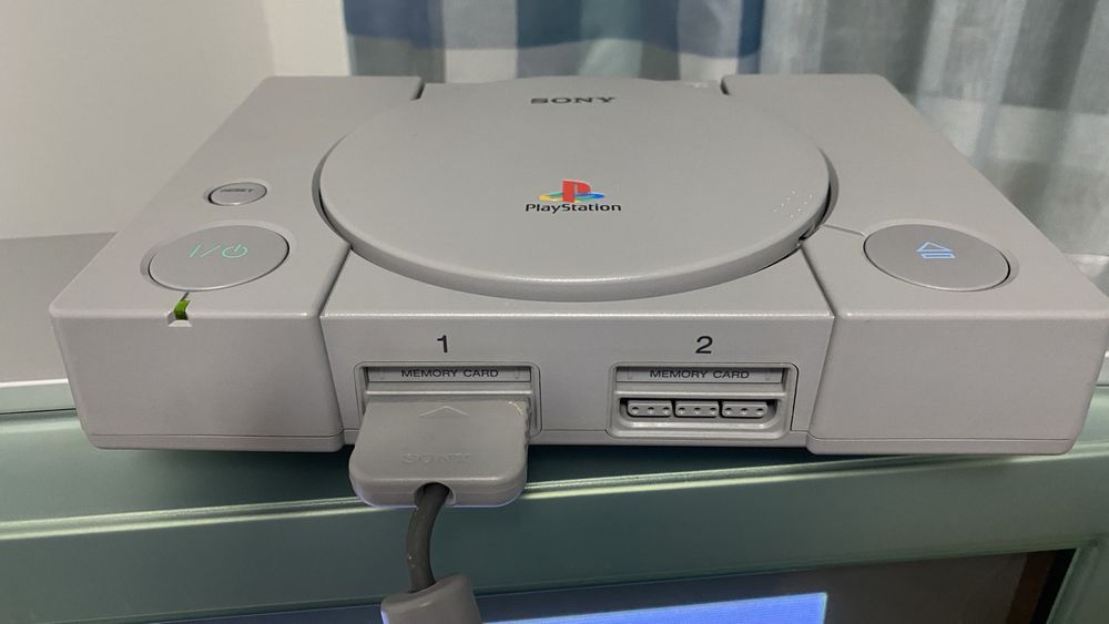 Playstation ps one + jogos e comandos